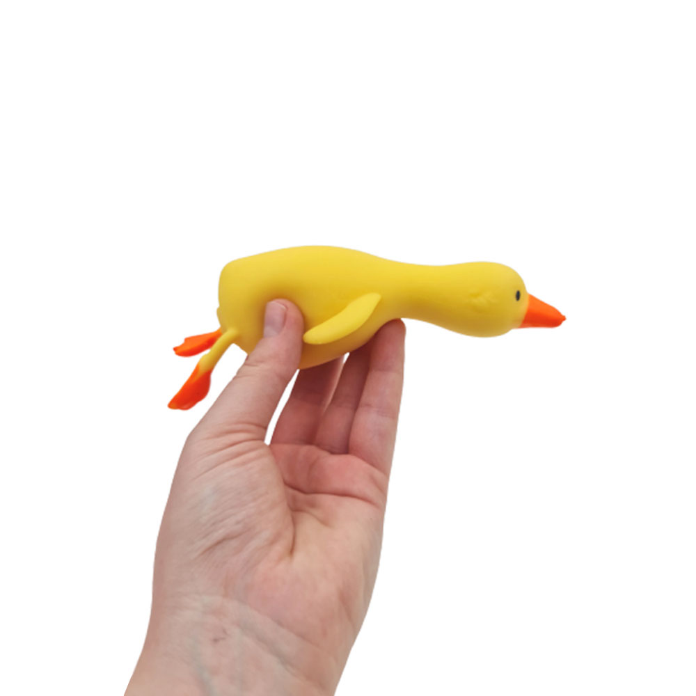 فیجت-ضد-استرس-مدل-اردک-خوابیده-زرد-در-دست